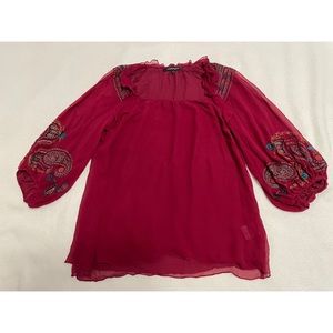 Nanette Lepore red silk blouse with embroidered wrist and shoulder design (2)